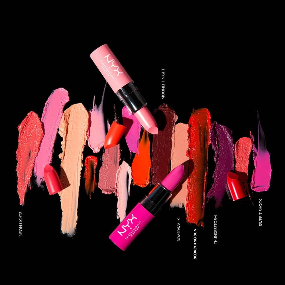 NYX Butter Lipstick Big Cherry alongside various vibrant lipstick shades on a black background.