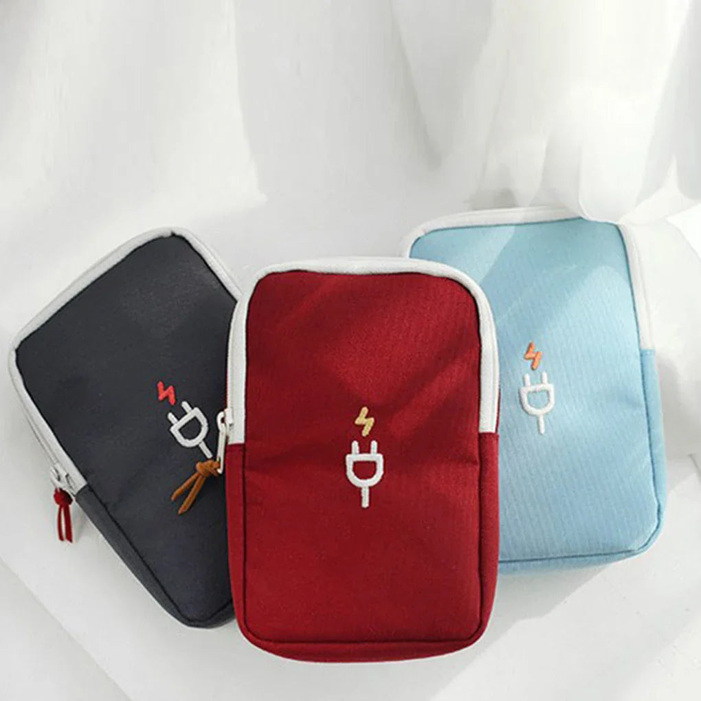 Stylish travel pouches in red, blue, and black, perfect for organizing beauty deals under 25 dollars.