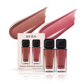 HERA Sensual Nude Lip Gloss Duo featuring #462 Speechless and #380 Cherish shades in mini bottles with swatches.