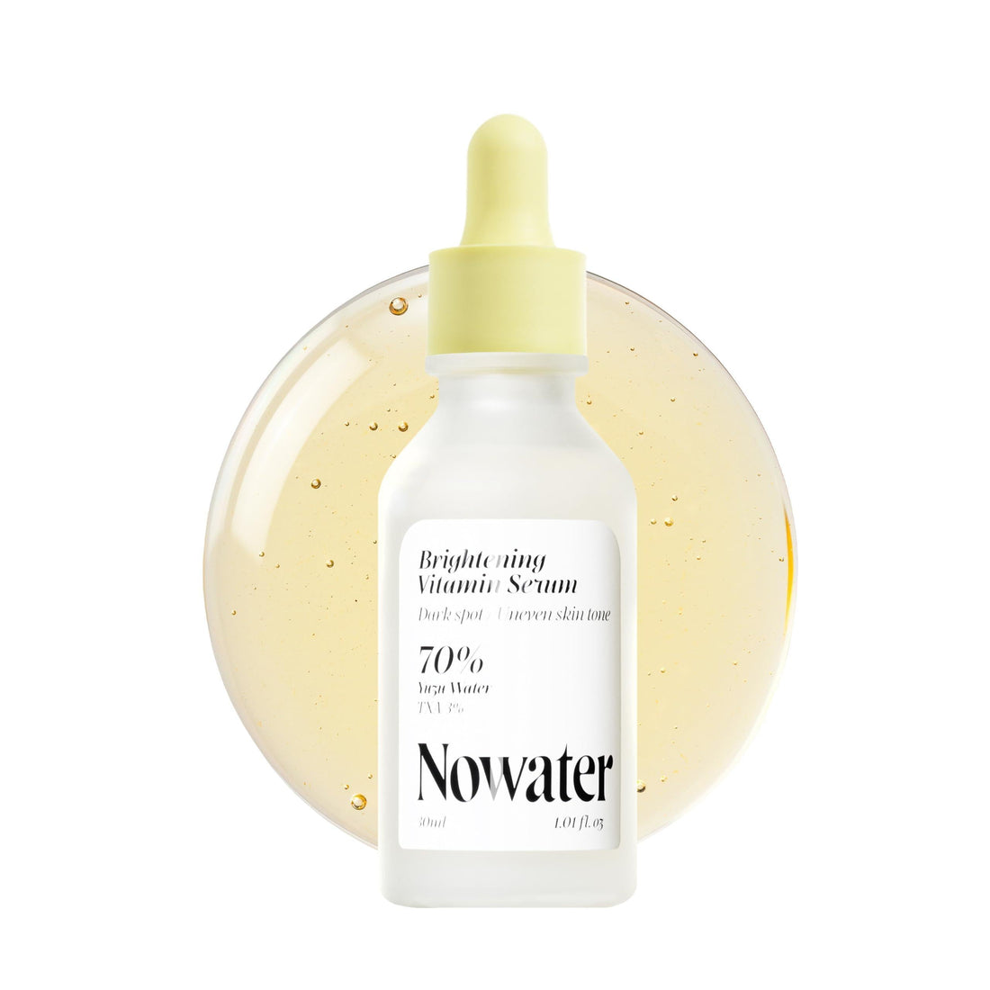 TXA vitamin serum for dark spots in a dropper bottle with brightening formula, designed to improve uneven skin tone.